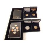 A cased Royal Mint proof GB set 2008, a 2008 Olympics £2, a Silver proof 1908 commemorative £2,