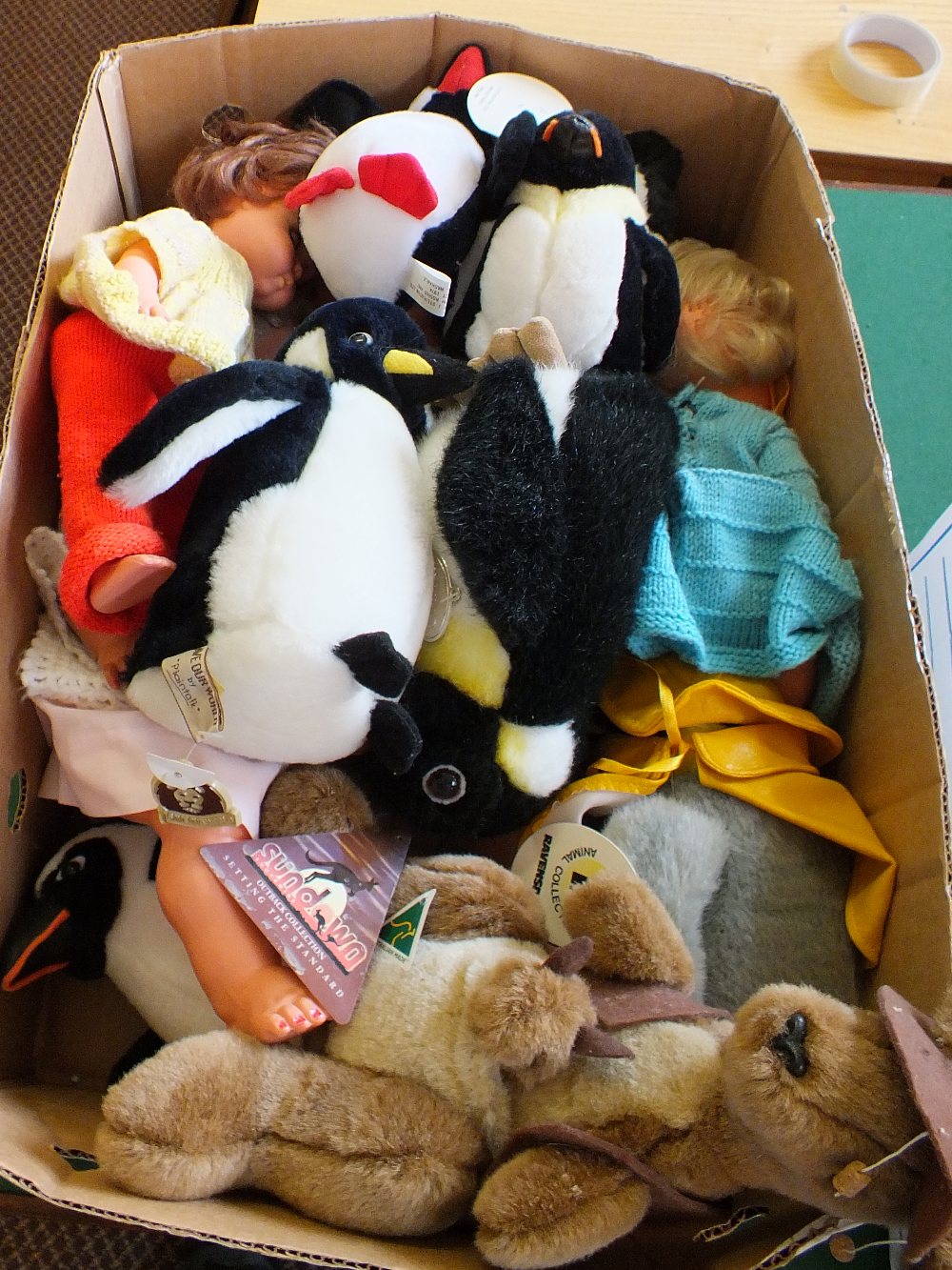 Various dolls and animal soft toys