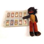 A Chad Valley felt ethnic doll and various cigarette cards