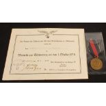 A German WWII (PATTERN) Luftwaffe 1st October medal with award document