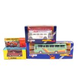 A boxed Corgi 341 Mini Marcos and two boxed buses