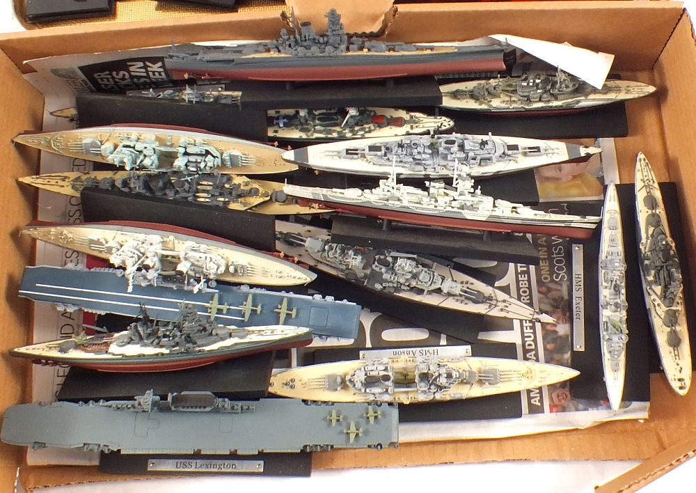 Various battleships on stands