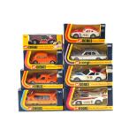 A boxed Corgi 323 Ferrari Daytona, Can Am Porsche 917, 396 Datsun 240Z, 383 VW 1200 orange,