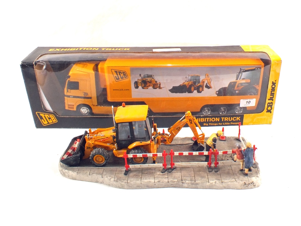 Border Fine Arts JCB Streetmaster Diorama and a boxed JCB Exhibition truck