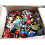 Various McDonalds toys and Smurfs