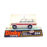 A boxed Dinky 254 Police Land Rover