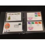 An albums of first day covers etc including 1969 high values and some special cancellations,