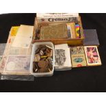 WWI Brass tobacco tin and various banknotes, coins, postcards,