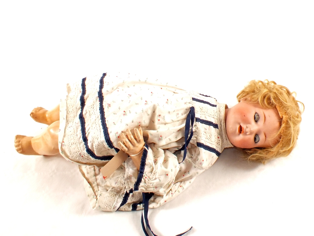 A Heubach Koppelsdorf porcelain head doll, marked 320.