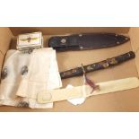 A mixed lot including miniature Tanto dagger in decorated scabbard and a Boar War era silk