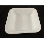 A square white porcelain bowl,