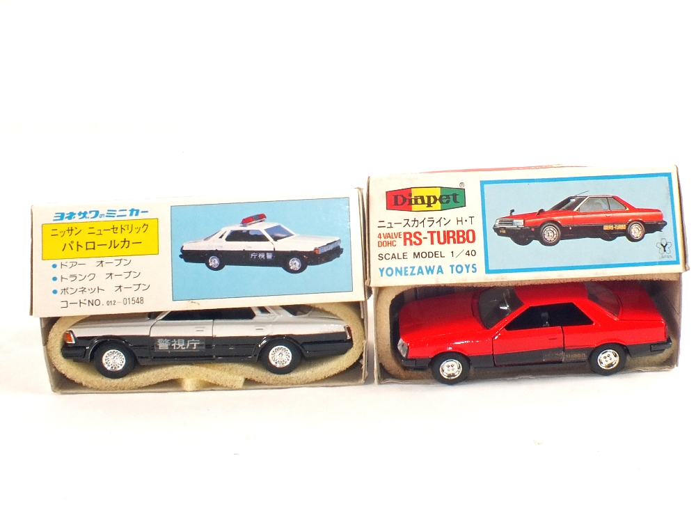 A boxed Diapol RS Turbo and a Nissan Cedric patrol car