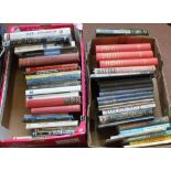 Four boxes of military related books including reference examples