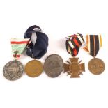 Four German (PATTERN) medals with a Black Wound badge