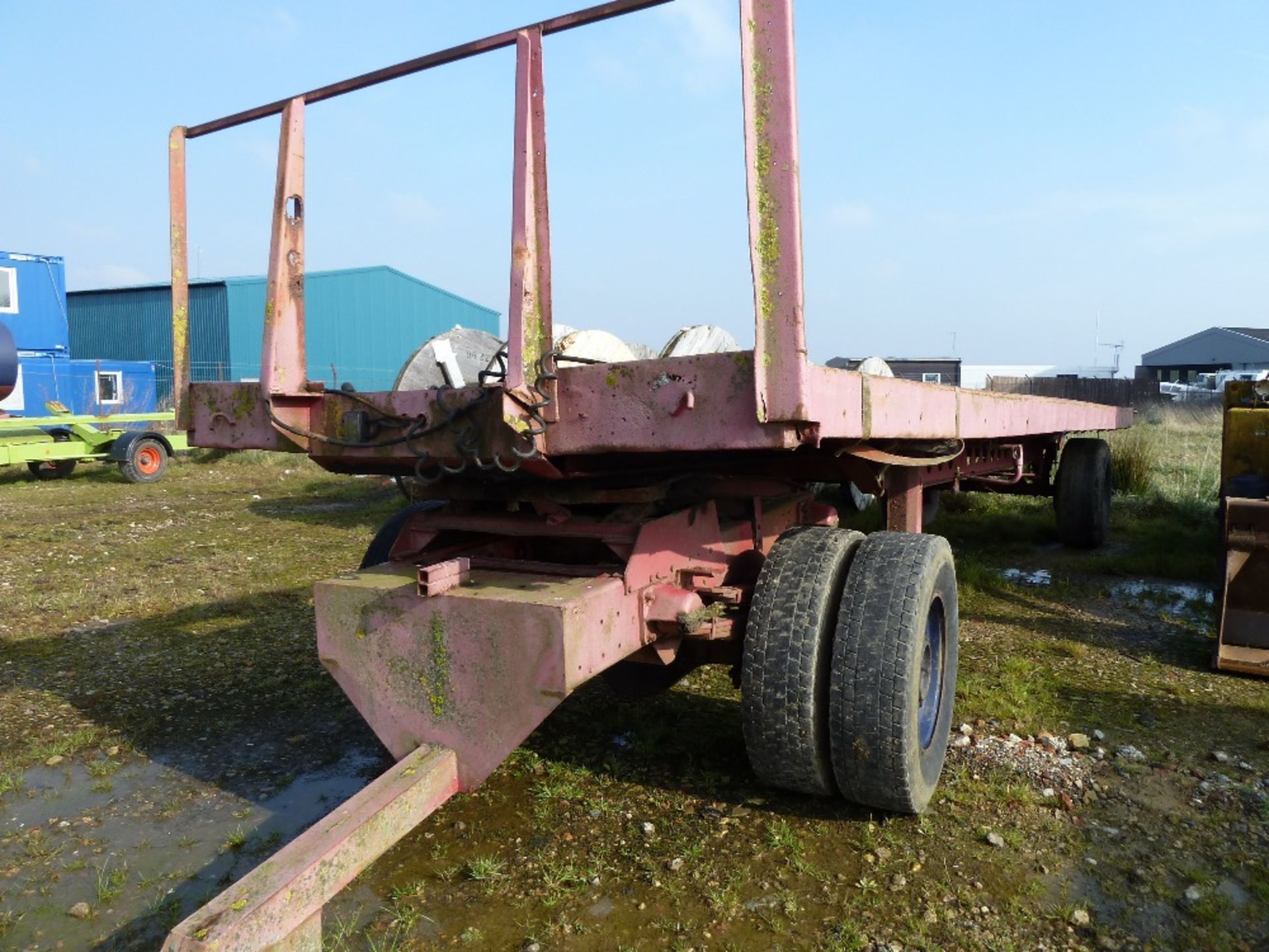 30' flat trailer, front bogie, rear single axle sprung, floor requires attention,