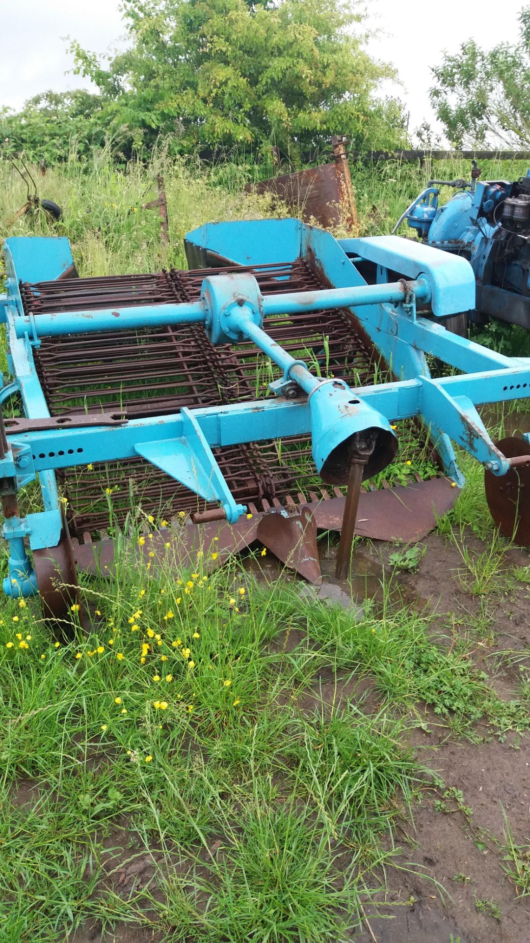 Ransome two row potato hoover in good reconditioned order. Stored near Bardwell.