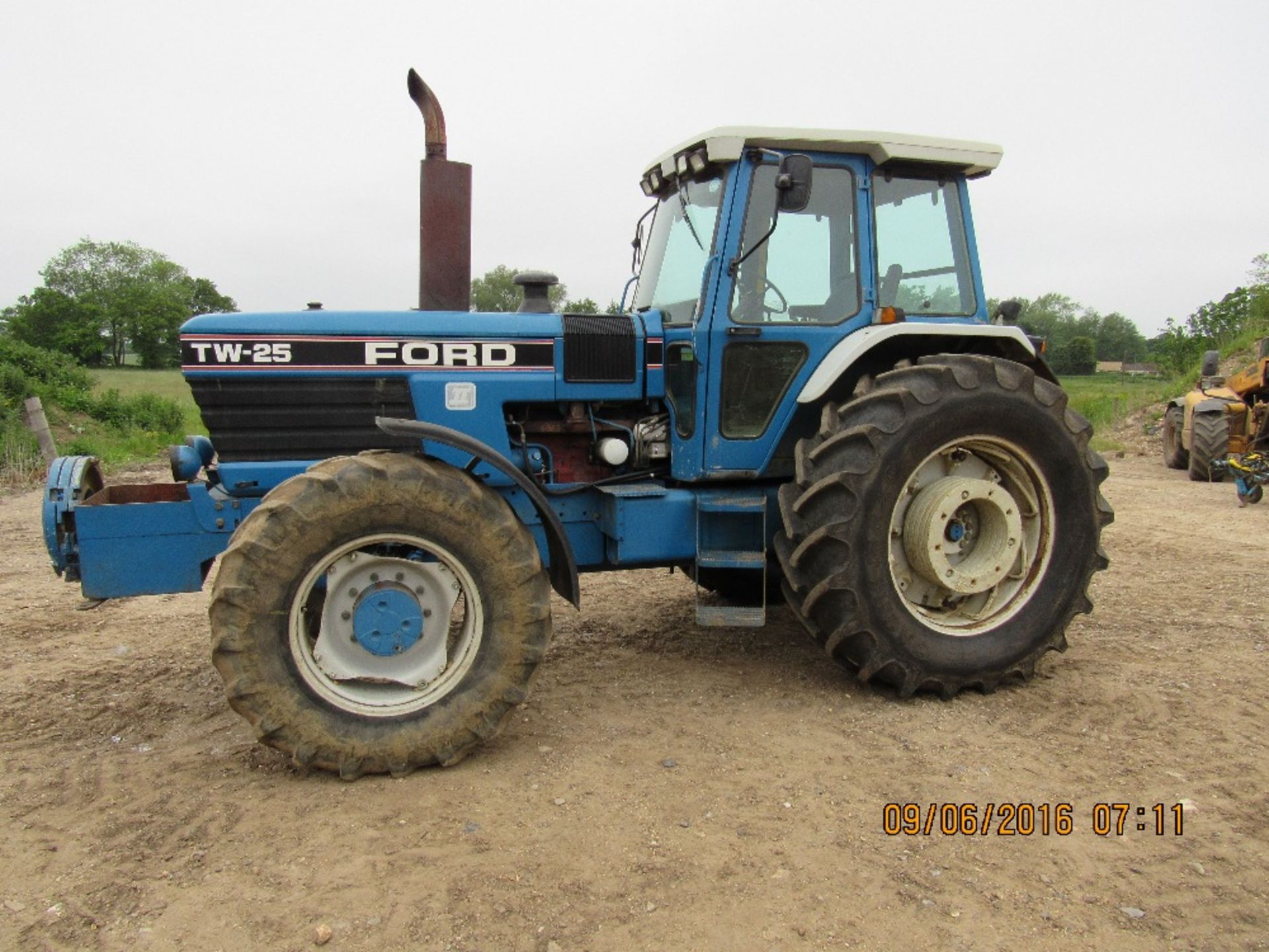 Ford TW-25 II, 4 wheel drive, H67 XEW, diesel, 8,776 hours, front weight tray,