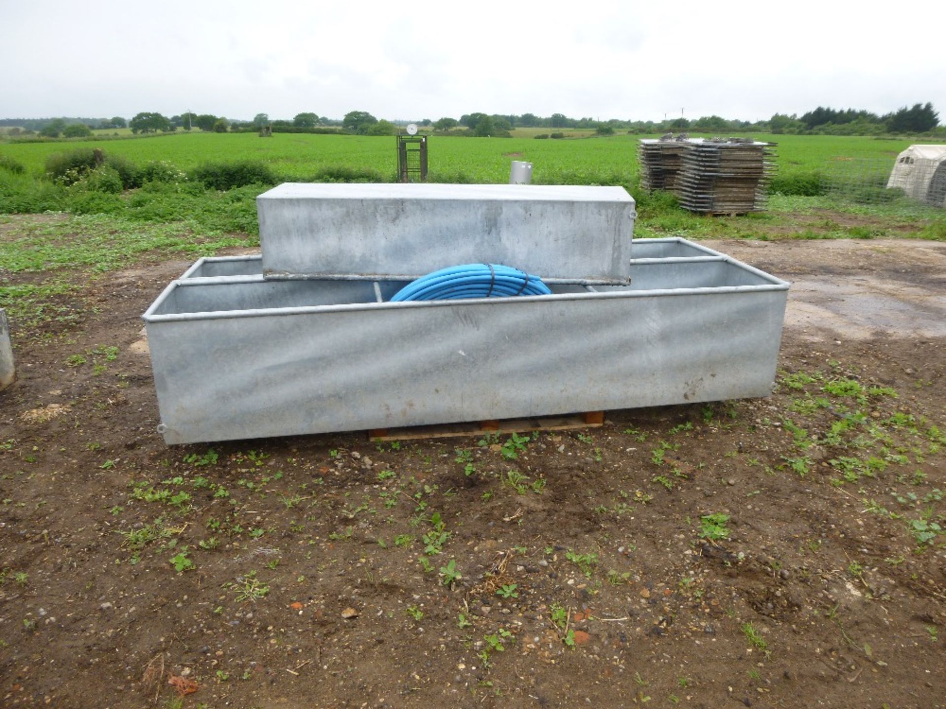 3 galvanised water troughs, (2 65cm x 300cm as new) (1 46cm x 180cm).