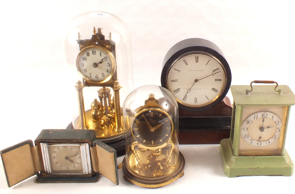 An ebonised and Mahogany mantel clock, dial marked Yale & Richardson,