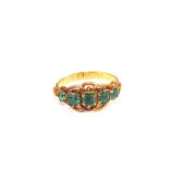 An 18ct Gold five stone set ring,