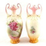 A pair of Edwardian porcelain floral vases