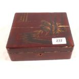 A Japanese lacquered box containing small Silver items etc including a fruit knife,