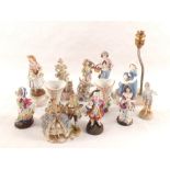 Two German porcelain parlour groups plus German and French figurines (two trays)