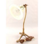 A Brass tripod base table lamp by Benson with vaseline glass shade