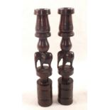 A pair of African hardwood elephant candlesticks