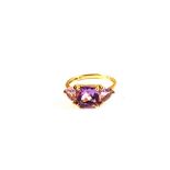 A 9ct Gold three stone Amethyst set ring,