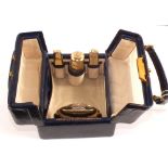 A blue Morocco case containing Silver gilt needle cases,