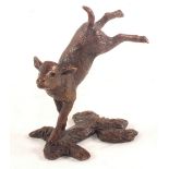 A limited edition solid Bronze figure of a spring lamb,