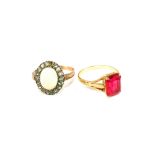 A 9ct Gold red stone set ring and a 9ct Gold and Silver Opal and white stone set ring