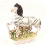 A 19th Century Staffordshire zebra