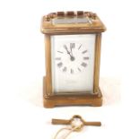 A Brass carriage clock, retail mark S.