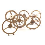 Six early 19th Century folding circular fire front Brass trivets,