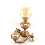 A Brass wall oil lamp and one other