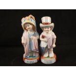 A pair of continental porcelain figurines,