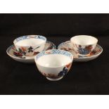 Two Lowestoft tea bowls and saucers plus a tea bowl (some damage)