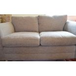 A nearly new Next mink upholstered sofa