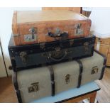 Five vintage suitcases in various sizes