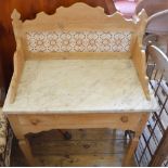 An Edwardian Pine white marble top tile back washstand