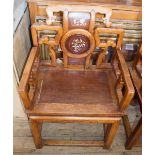 A pair of Chinese hardwood armchairs with ivory figure and floral inlays