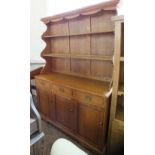 An Oak shelf back dresser