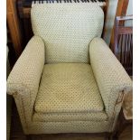 A pair of Edwardian green and cream upholstered armchairs