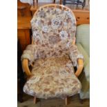 A Canadian Dutailier modern Ash carved rocking chair with cream floral print fabric