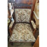 An Edwardian carved Mahogany armchair