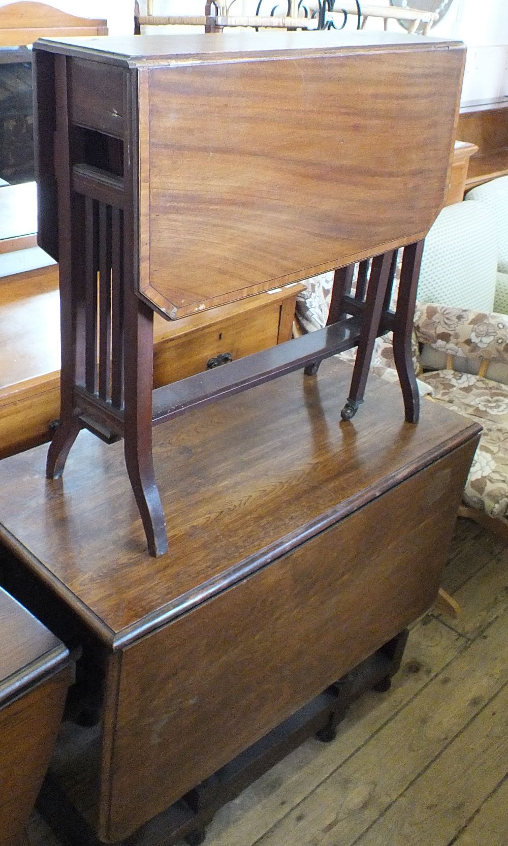 An Edwardian inlaid Mahogany Sutherland table and an Oak gate leg table