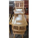 A set of three Beechwood hard seat carver chairs and a rectangular modern dining table