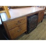A Mahogany four drawer kneehole desk